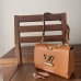 Bolsa Louis Vuitton M20834 Twist MM em couro Epi com pingentes esmaltados