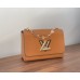 Bolsa Louis Vuitton M20834 Twist MM em couro Epi com pingentes esmaltados