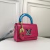 Сумка Louis Vuitton Twist MM с ручкой из плексигласа M56112